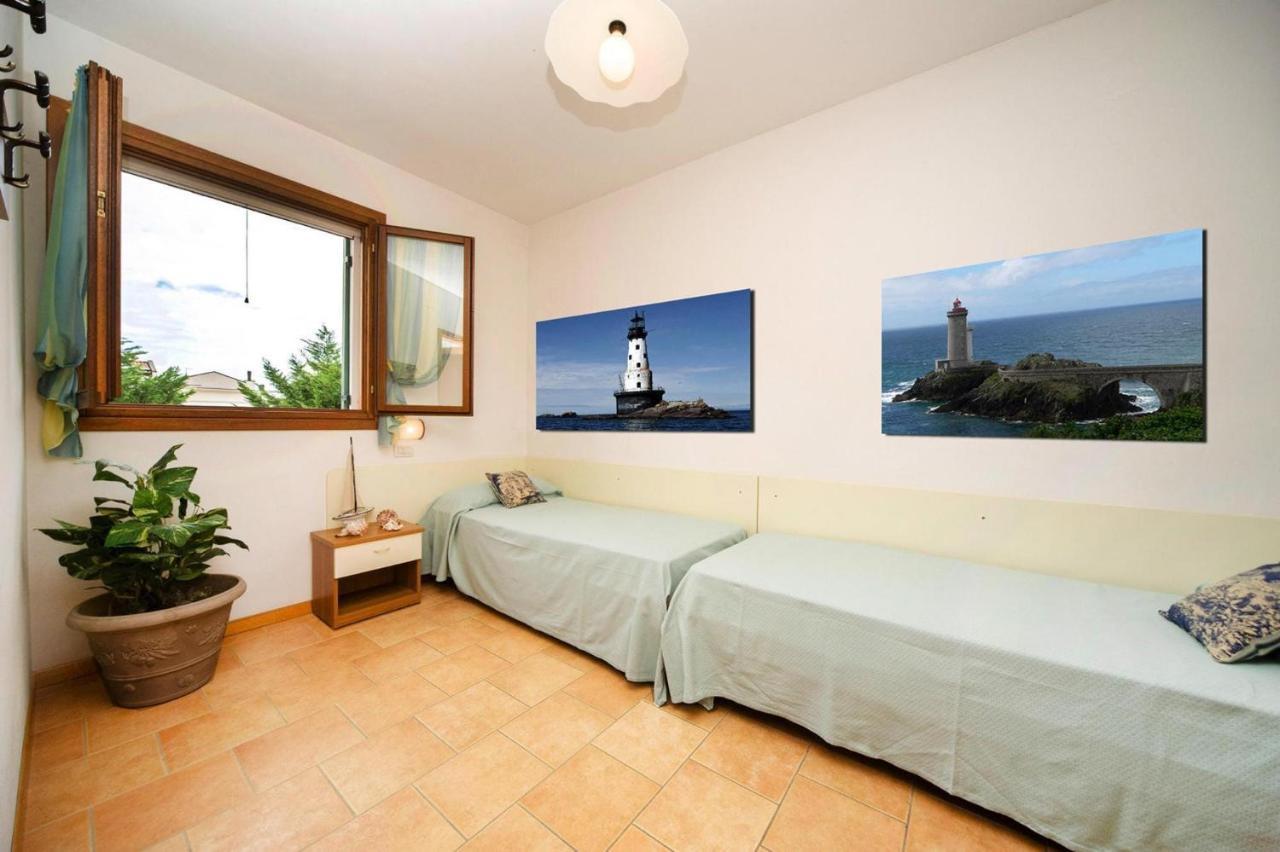 Terraced House In The Ca' Del Pino Holiday Complex With Communal Pool In Bibione Eksteriør bilde